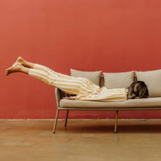 Brain tapping for sleep: A woman sleeping on a sofa