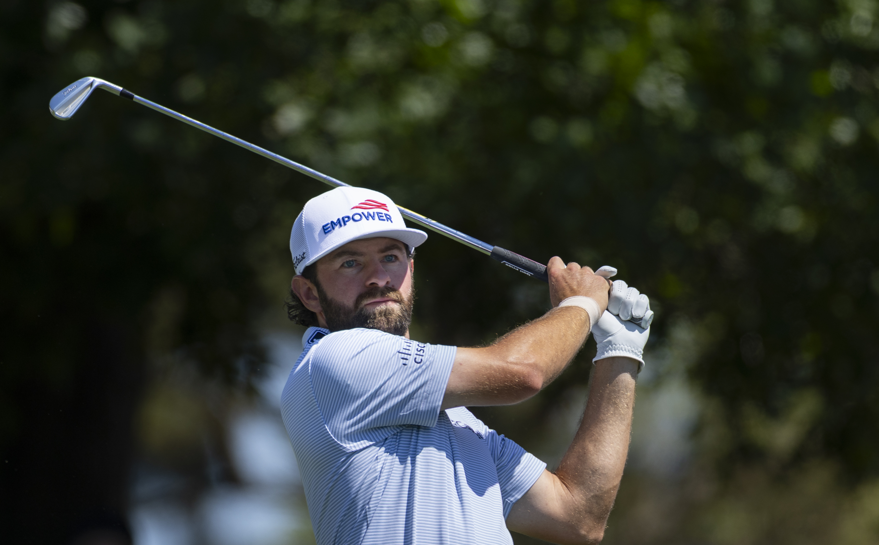 Cameron Young plays a stroke from the No. 4 tee during the third round of the Masters at Augusta National Golf Club
