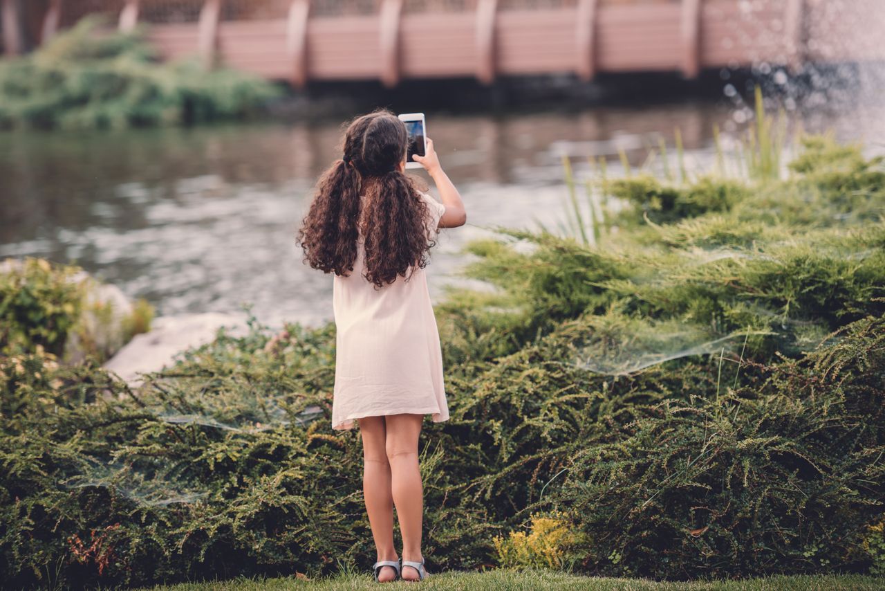 Tiny smartphone user.