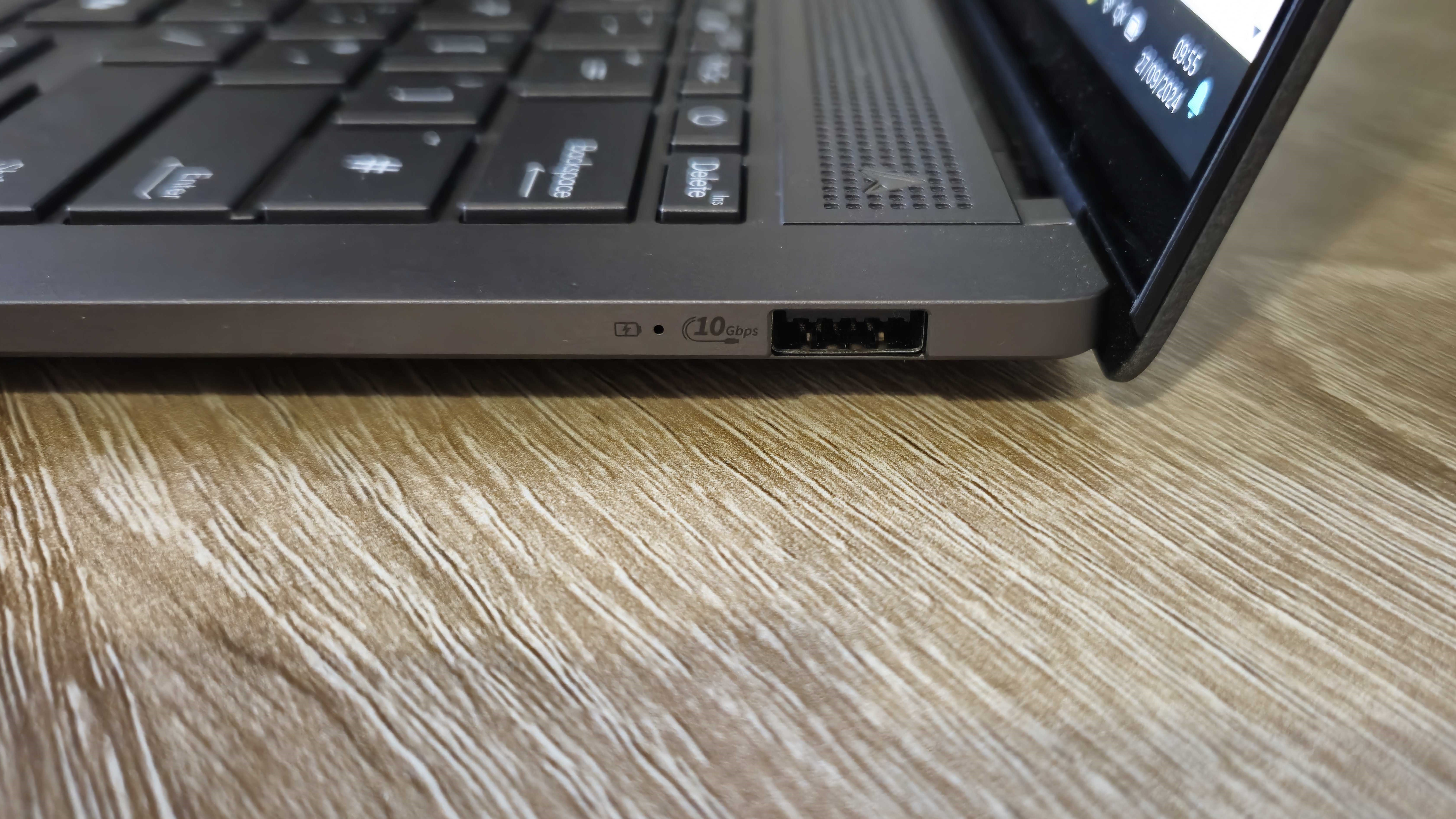 The Asus Zenbook S 14 viewed from its other side to show off one USB port