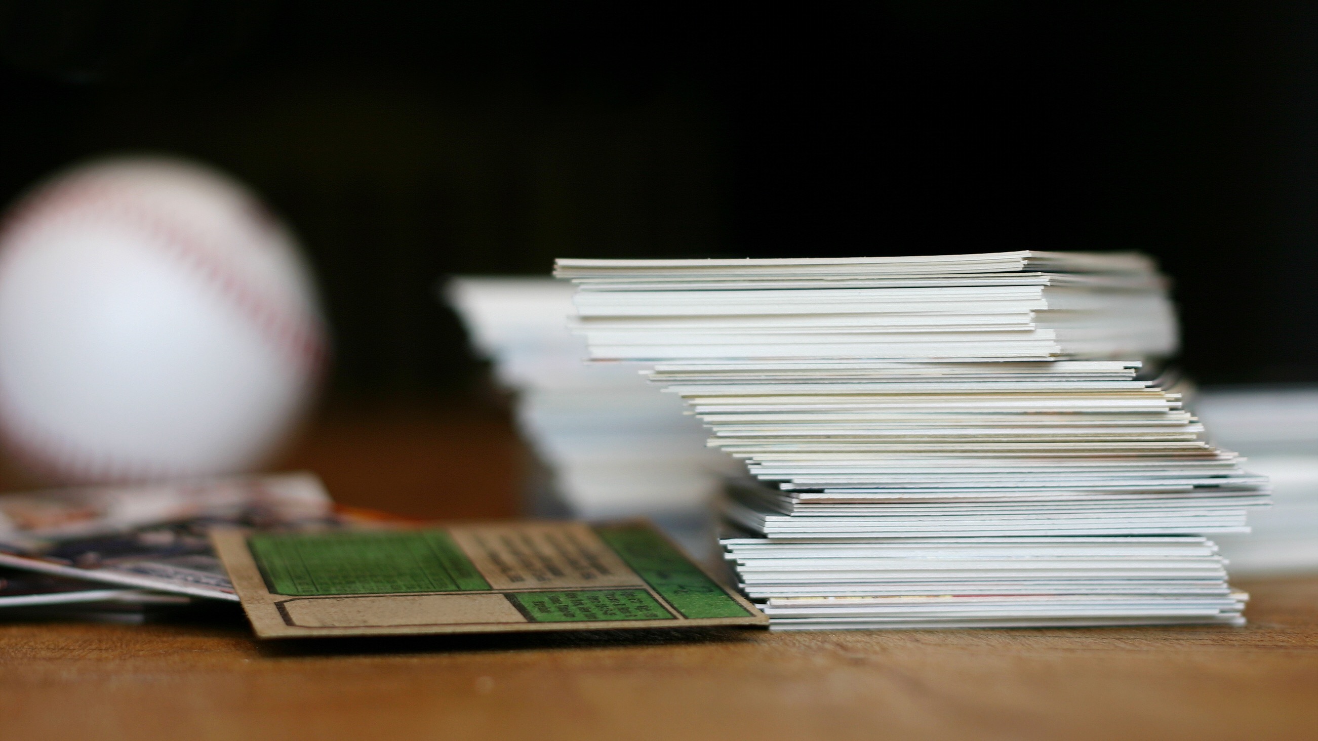 A pile of sports trading cards