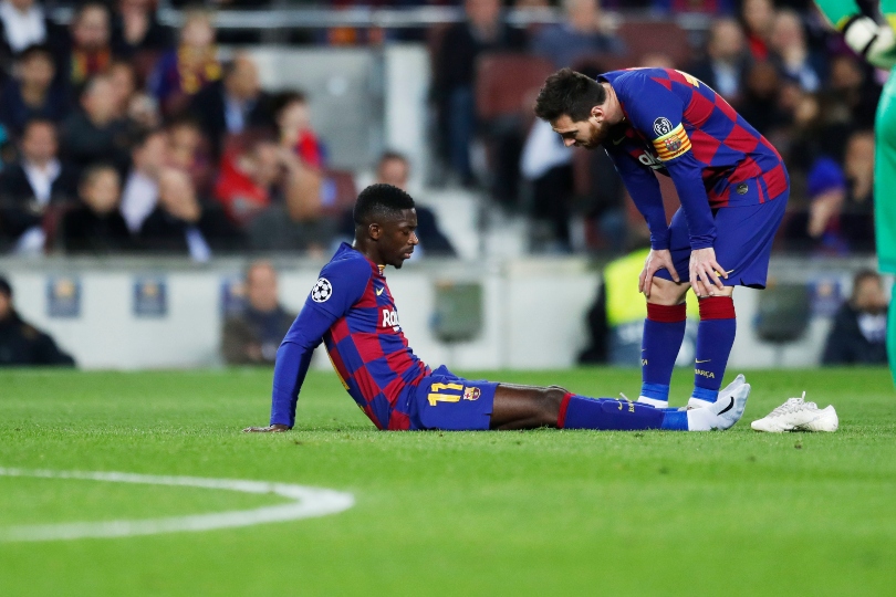 Ousmane Dembele and Lionel Messi