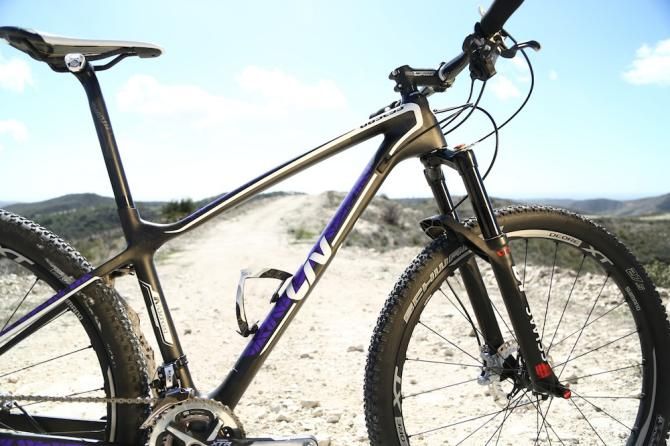 The Obsess Advanced team bike is a women's-specific hardtail race bike, handcrafted with Advanced-grade composite and engineered for 27.5 wheels.