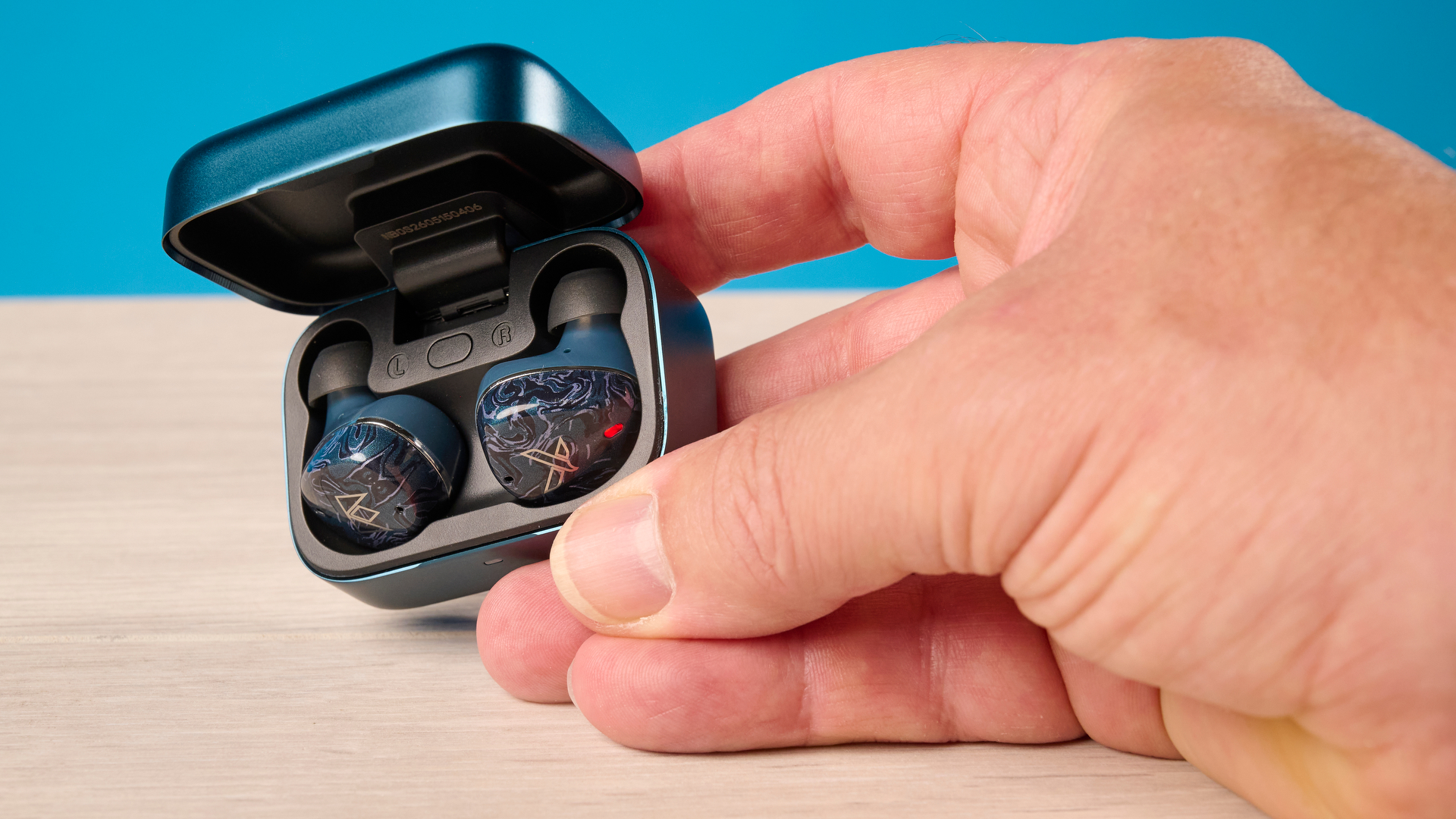 A pair of Noble Audio Osprey wireless earbuds