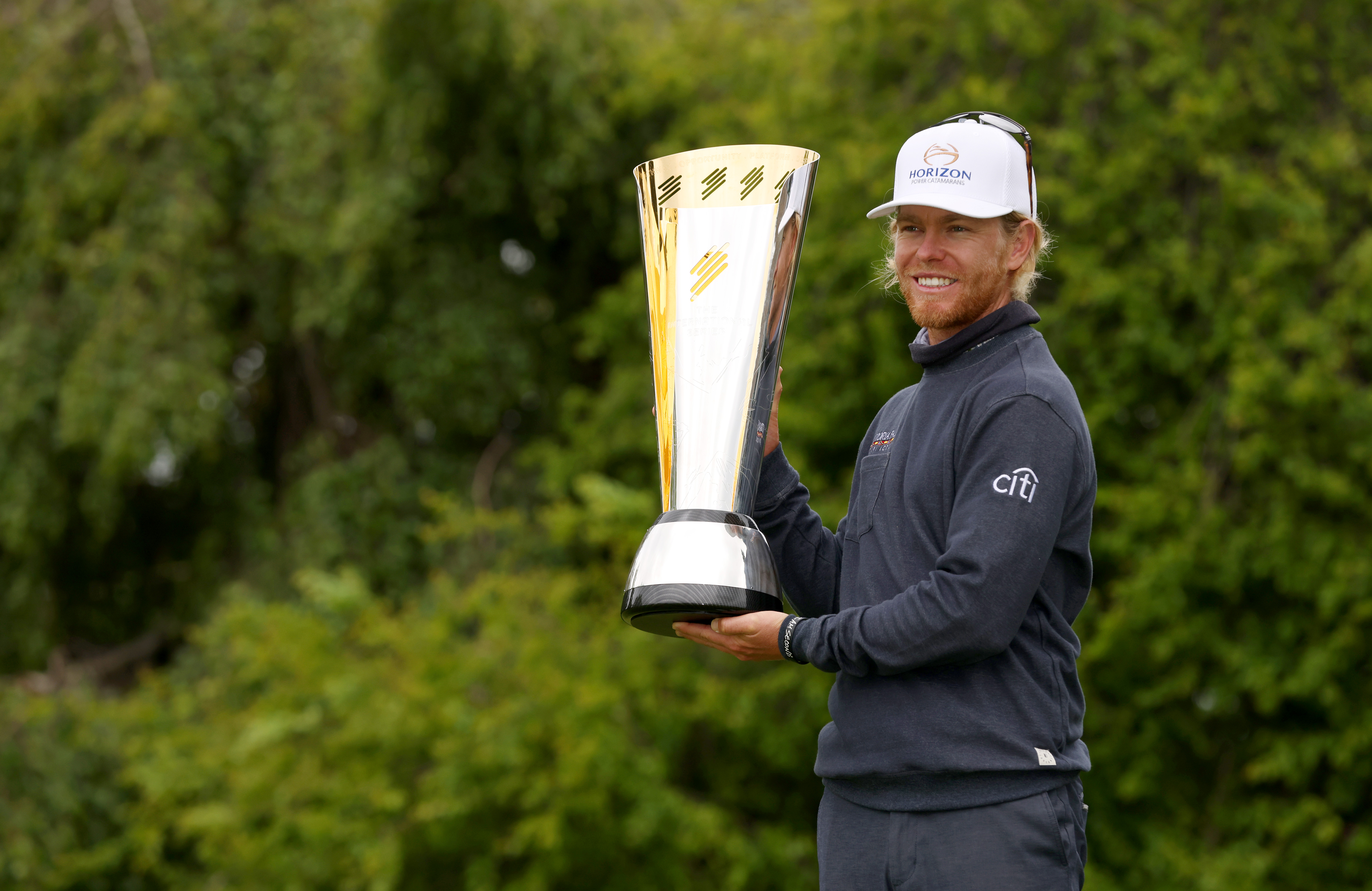 Scott Vincent poses with the International Series England trophy