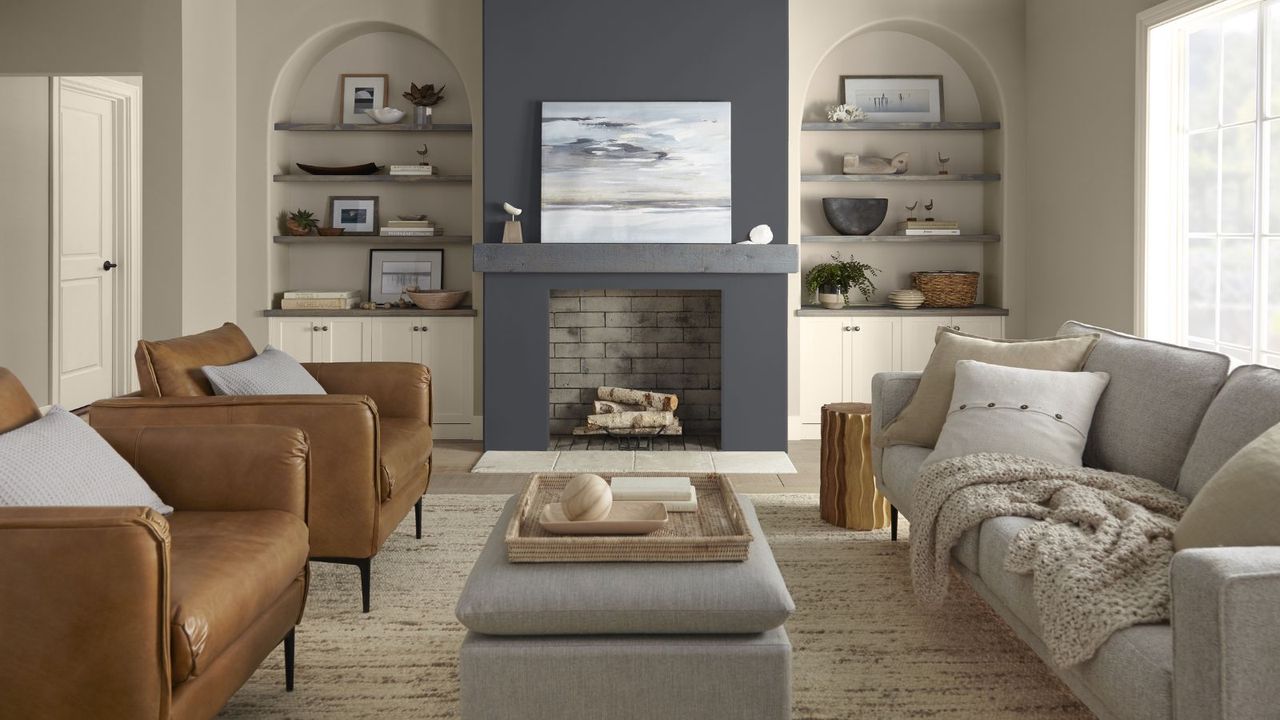 modern living room with neutral color scheme and dark gray accent wall