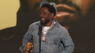 Kendrick Lamar accepting Grammy for Record of the Year