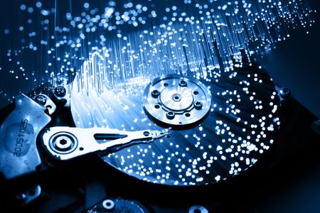 A hard disk drive with fiber optics overlayed