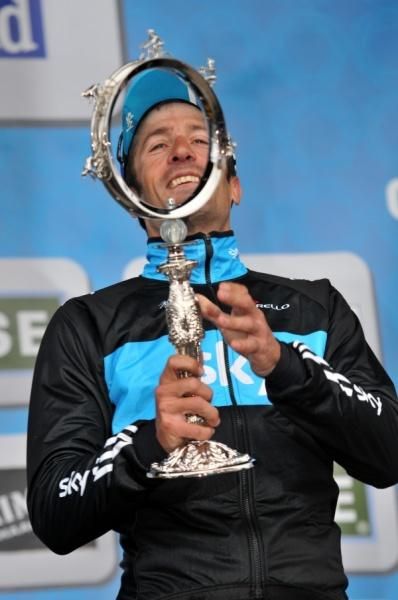 Flecha prepares to hoist his prize aloft