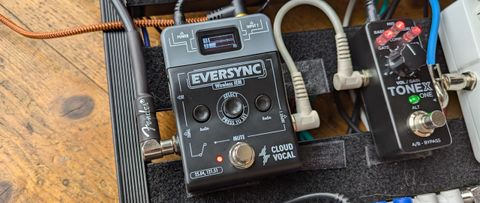 A Cloudvocal EverSync Wireless IEM transmitter on a pedalboard