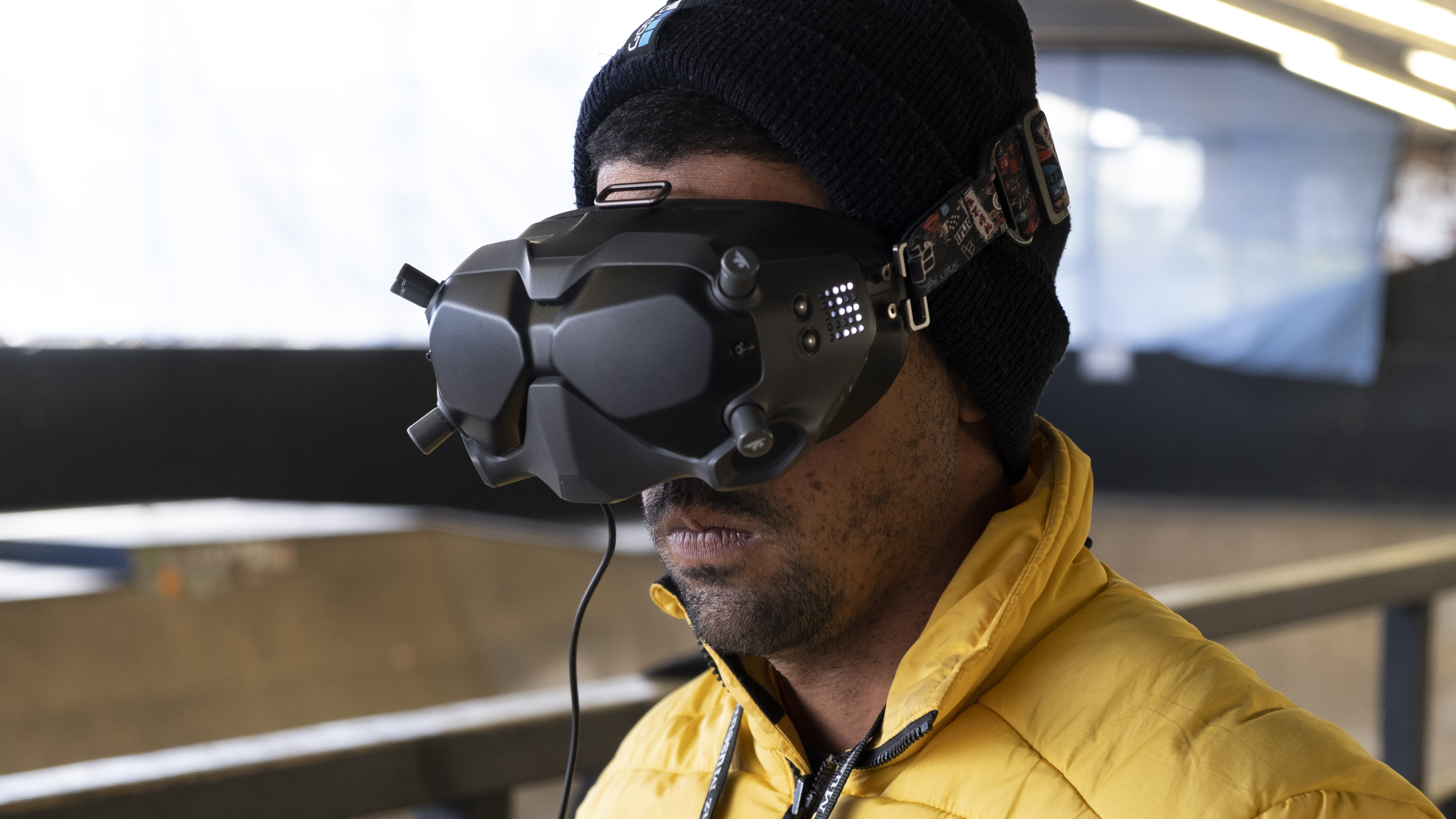 A man wearing wearing an FPV headset