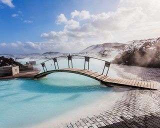Bridge at the iconic popular Blue Lagoon thermal baths and spa, Iceland