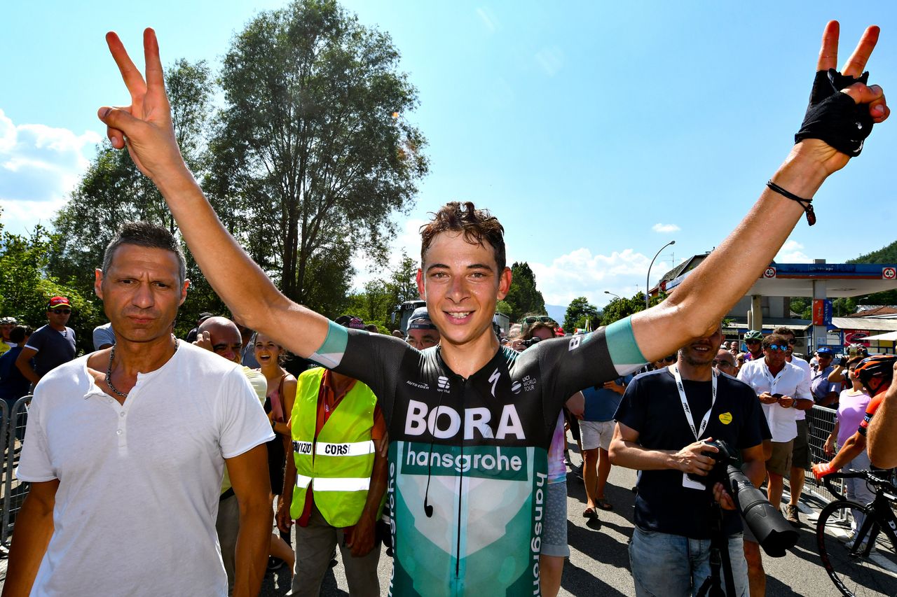 Davide Formolo delighted as he makes his way to the podium