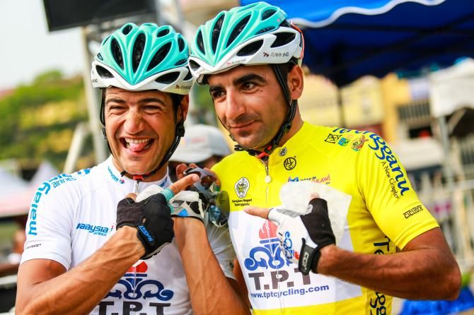 Race leader Mirsamad Pourseyedigolakhour (Tabriz Petrochemical Team) enjoys a joke with a teammate