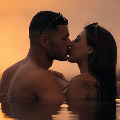 kal and sarover kiss in a pool at sunset in love is blind uk season 2