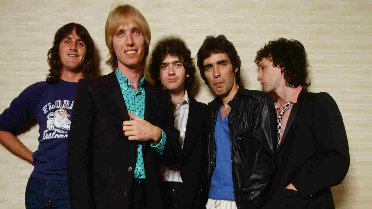 Tom Petty &amp;amp; The Heartbreakers posing for a photograph in 1980
