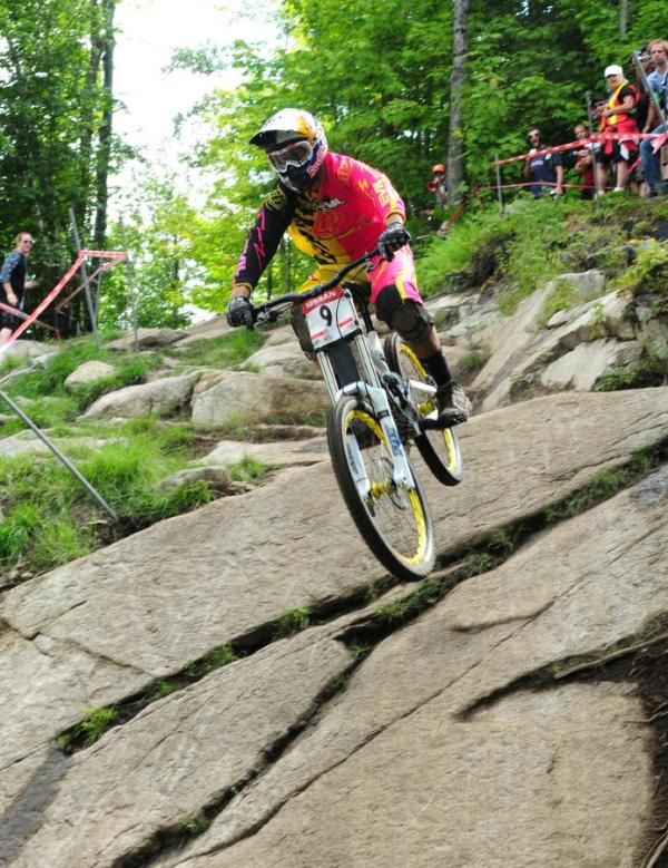 Steve Smith on a granite rock face.