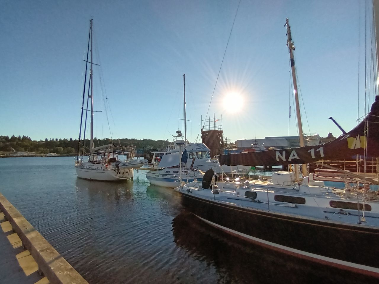 Ultrawide photo of boats docked at a harbor