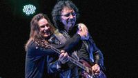 Ozzy Osbourne hugs Tony Iommi as Black Sabbath performs during the 13th tour at Apoteose Square, Sambodromo of Rio de Janeiro, October 13, 2013