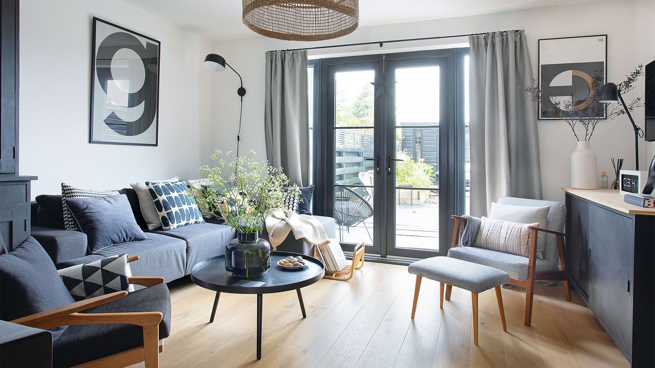 black and white living room with round coffee table