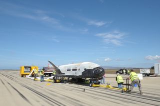The U.S. Air Force's third X-37B space plane mission comes to an end with a smooth landing at Vandenberg Air Force Station in California on Oct. 17, 2014.