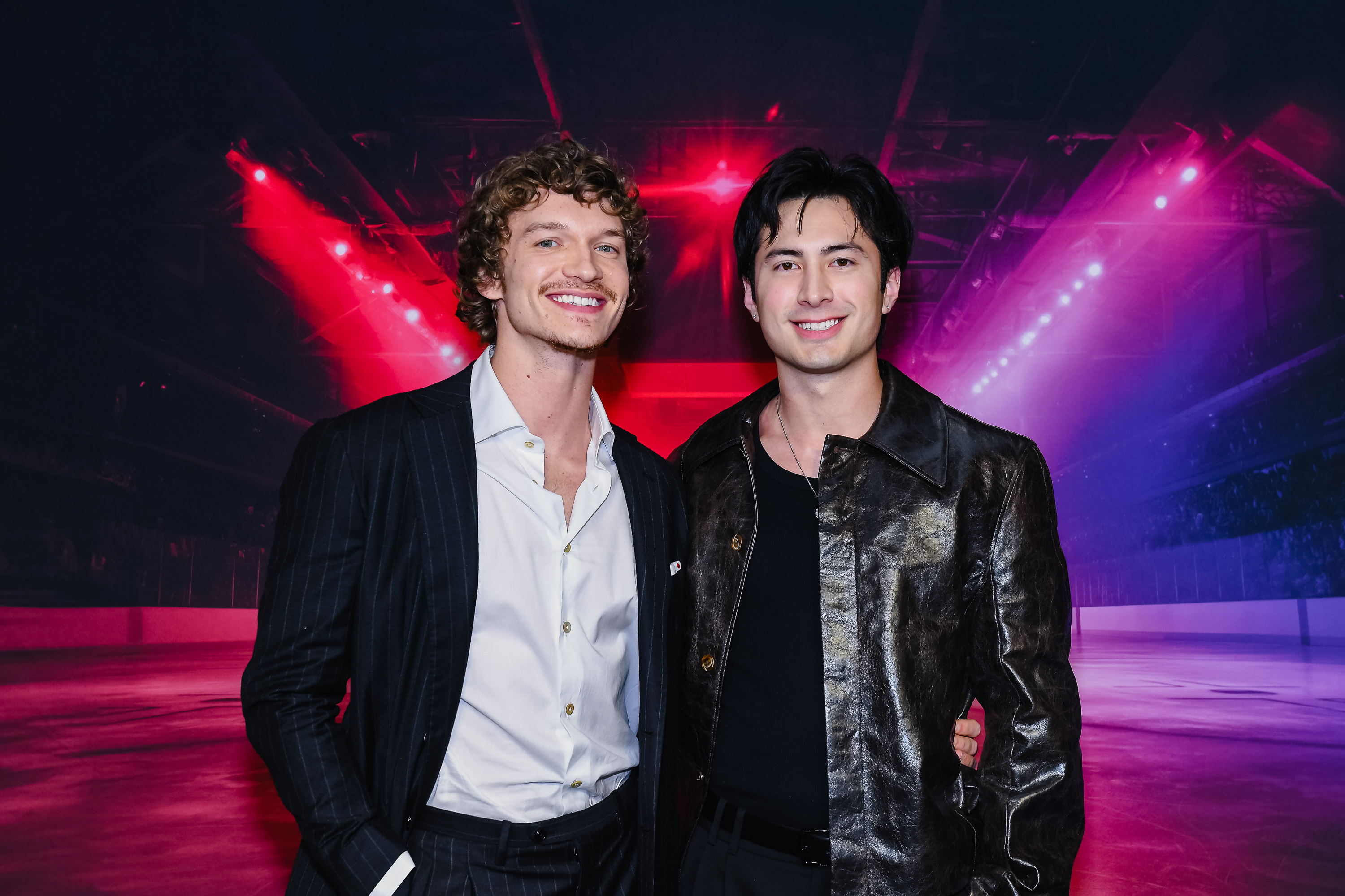 Connor Storrie and Hudson Williams attend the premiere of &quot;Heated Rivalry&quot; at TIFF Lightbox on November 24, 2025 in Toronto, Ontario.