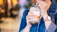 Close-up of woman drinking bubble tea