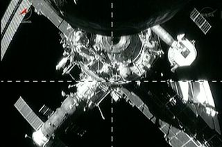 View from a camera on board Progress M-19M (51P), as the Russian cargo freighter undocked from the International Space Station (ISS) on June 11, 2013.