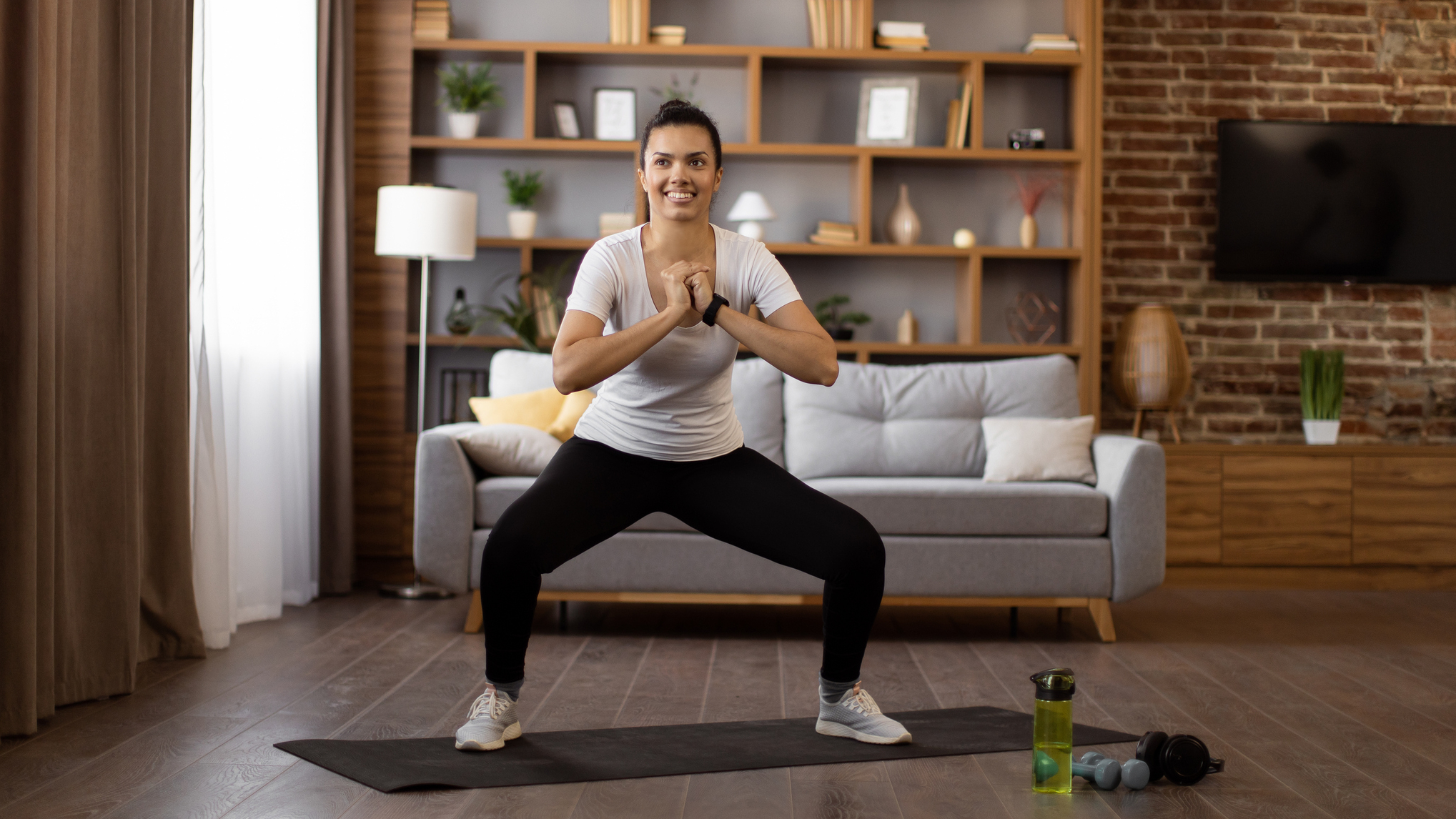 Woman exercising at home
