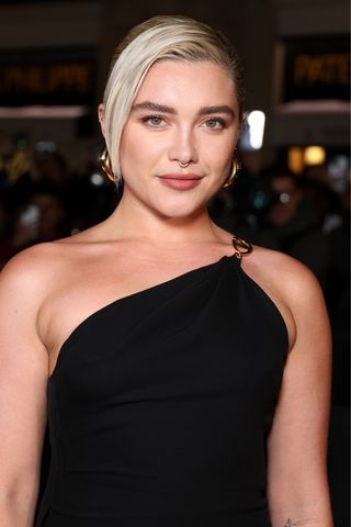 Florence Pugh is seen with a single strand hairstyle as she attends the Valentino Haute Couture Spring/Summer 2024 show as part of Paris Fashion Week on January 24, 2024 in Paris, France.
