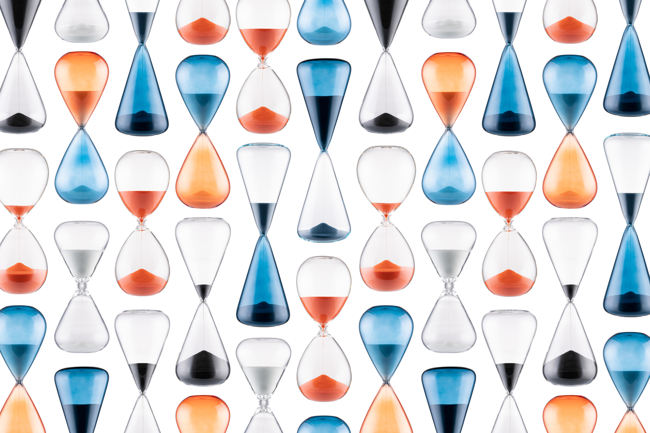 Blue and Orange Colored Sand Hourglass Pattern Repetition Pattern Full Frame View.