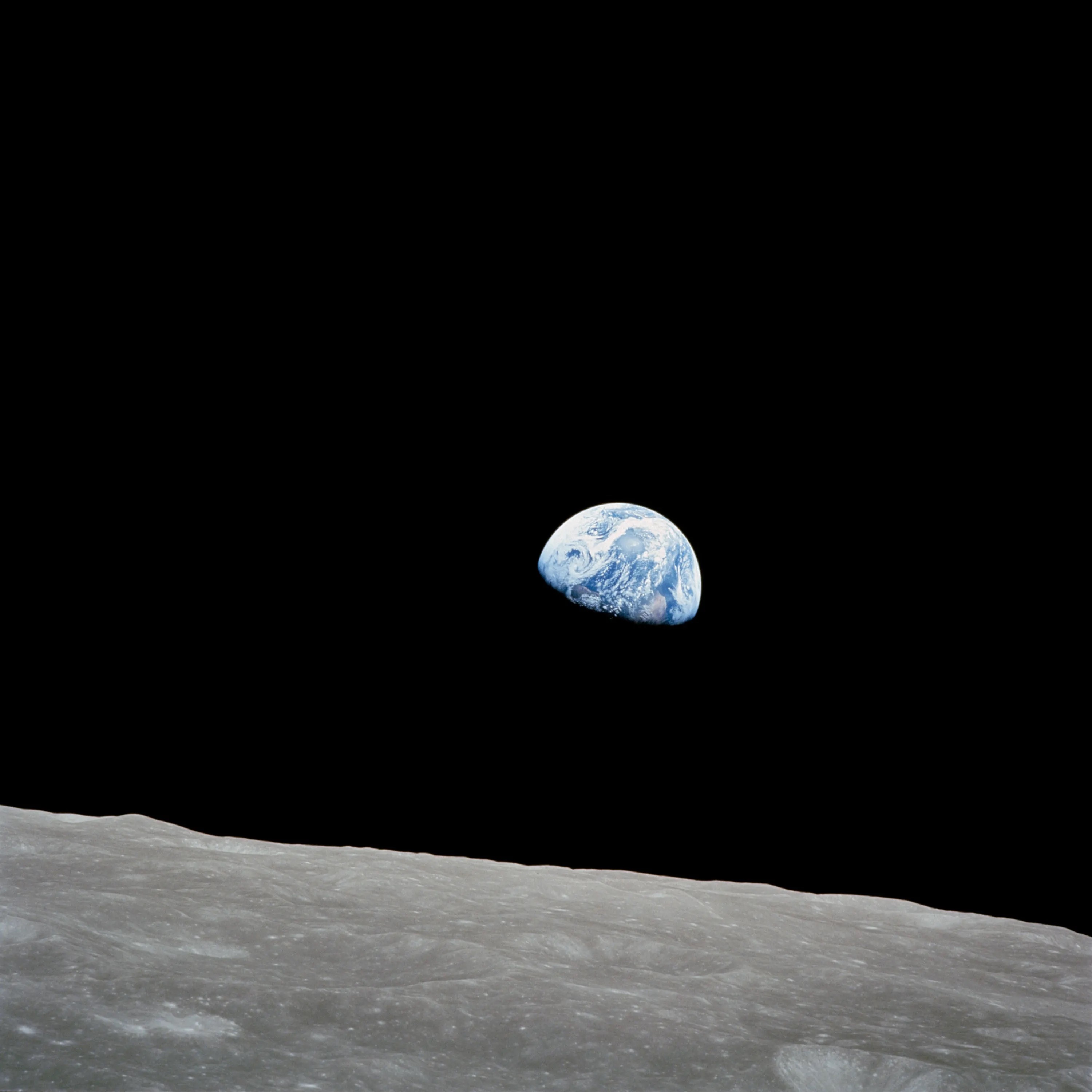 The earth rising over the moon