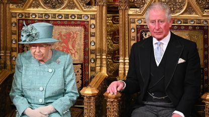 Queen Elizabeth II and Prince Charles, Prince of Wales attend the State Opening of Parliament in the House of Lord's Chamber on December 19, 2019 in London, England