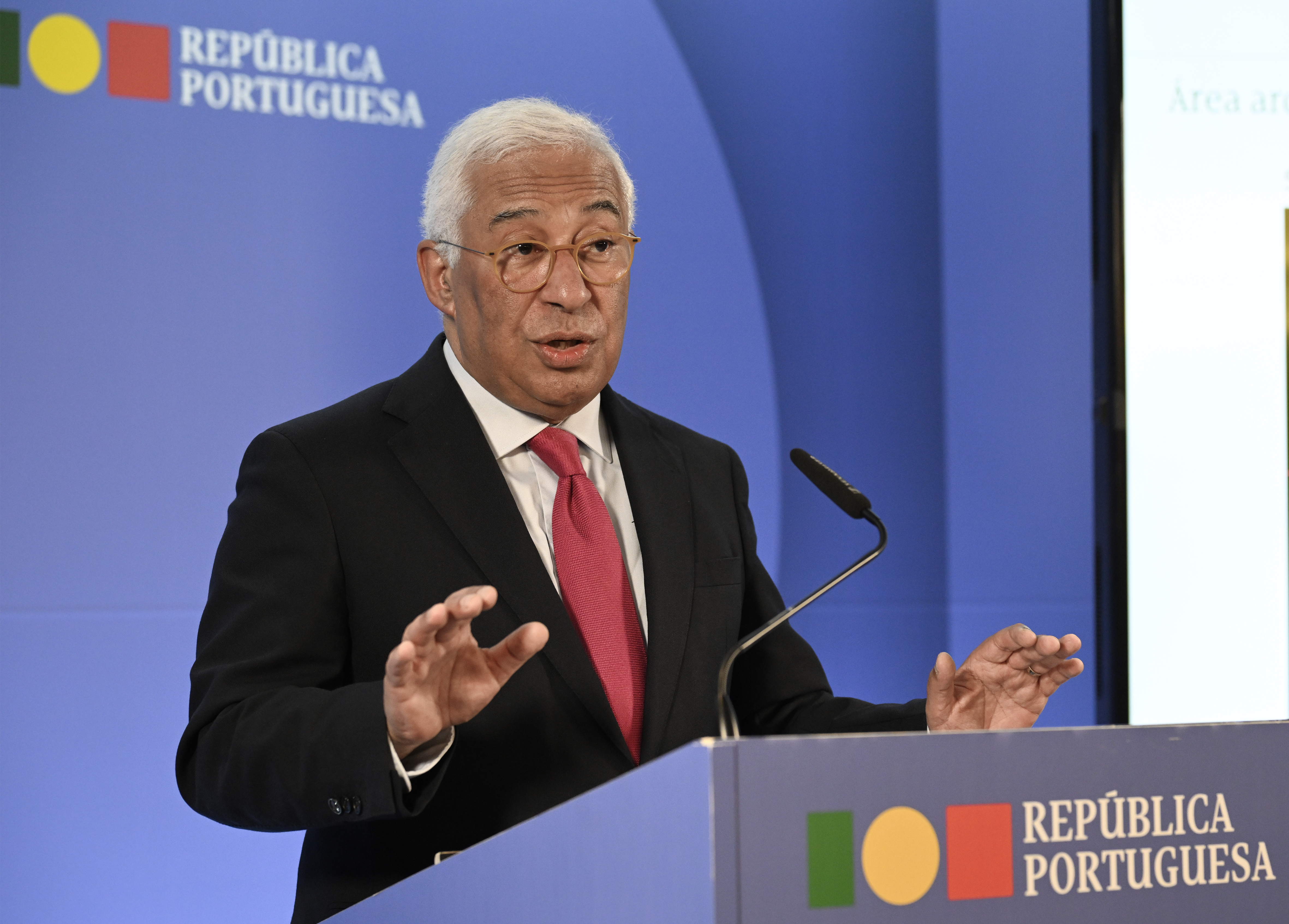 Former Portuguese Prime Minister Antonio Costa gives a speech in front of the old government of Portugal logo