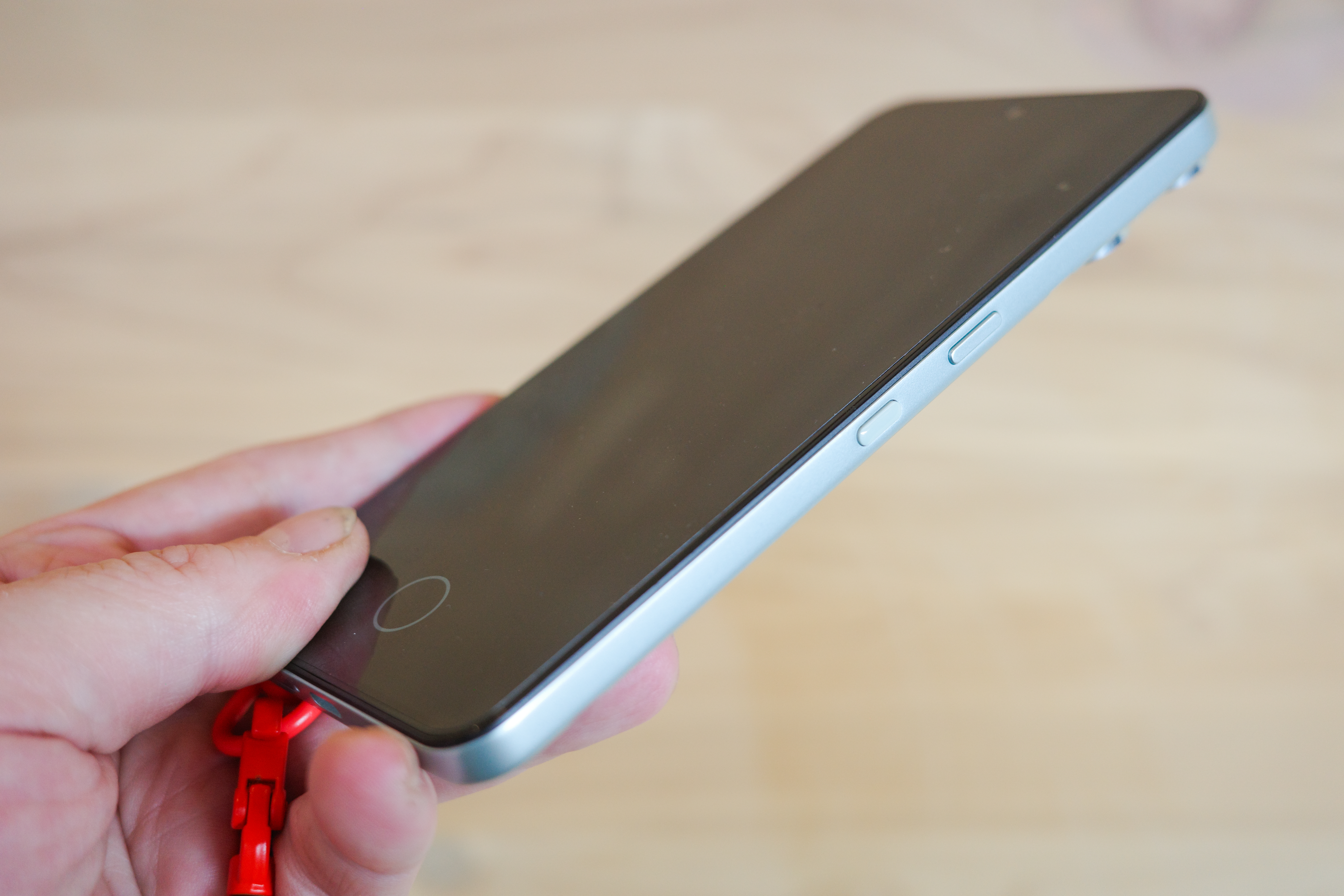 CMF Phone 2 Pro in light green showing back with exposed screws and cameras
