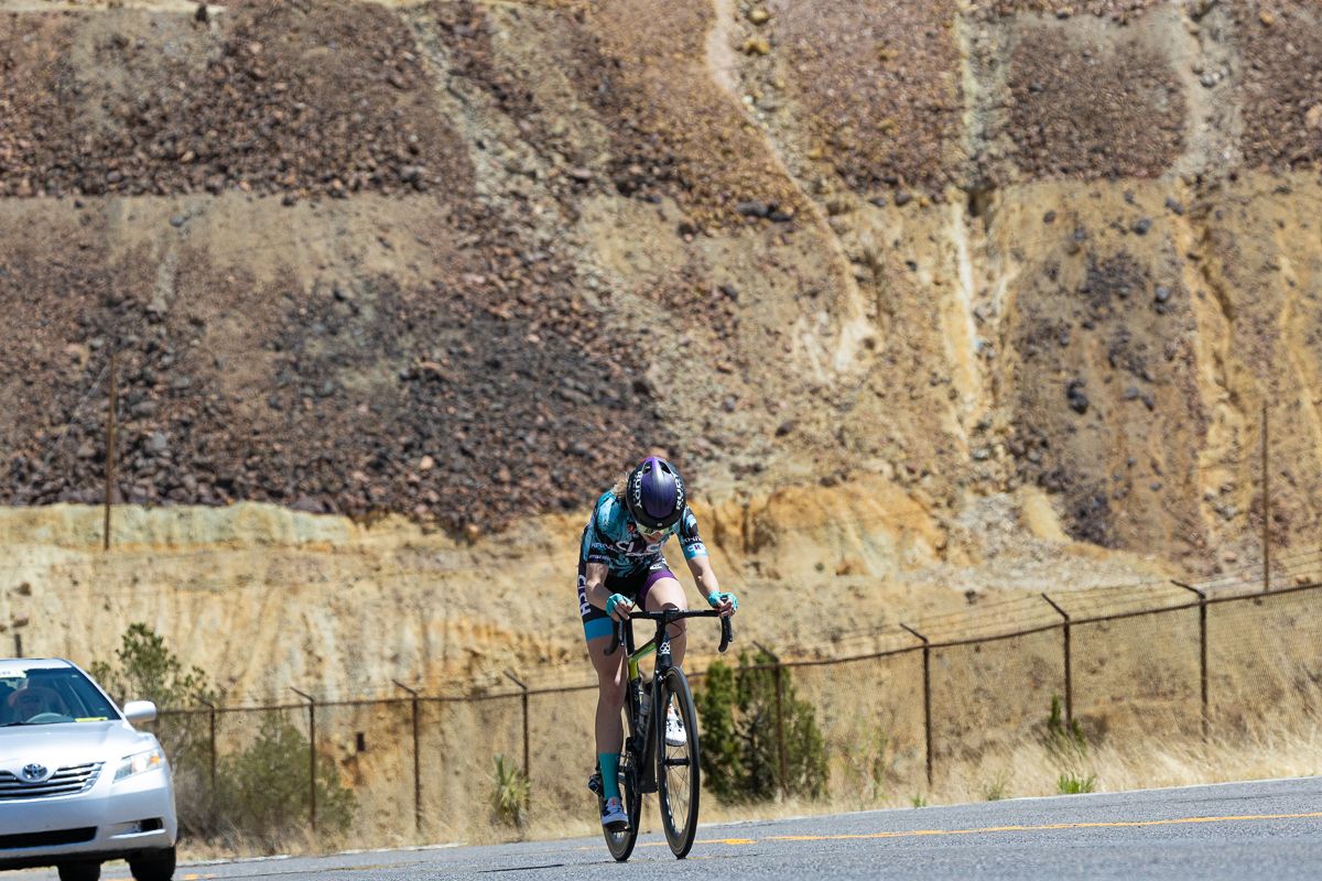 Fighting headwinds alone is kind of Lauren De Crescenzo's thing. After a disappointing mechanical on the finishing climb of Stage 1, the Cinch Rise rider set out early on her own, putting 5 minutes and 23 seconds between her and second place.