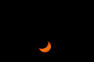 Astronomer Jay Pasachoff of Williams College took this photo of the first solar eclipse of 2014 at its near-maximum, with about 65 percent of the sun blocked by the moon, on April 29, 2014.