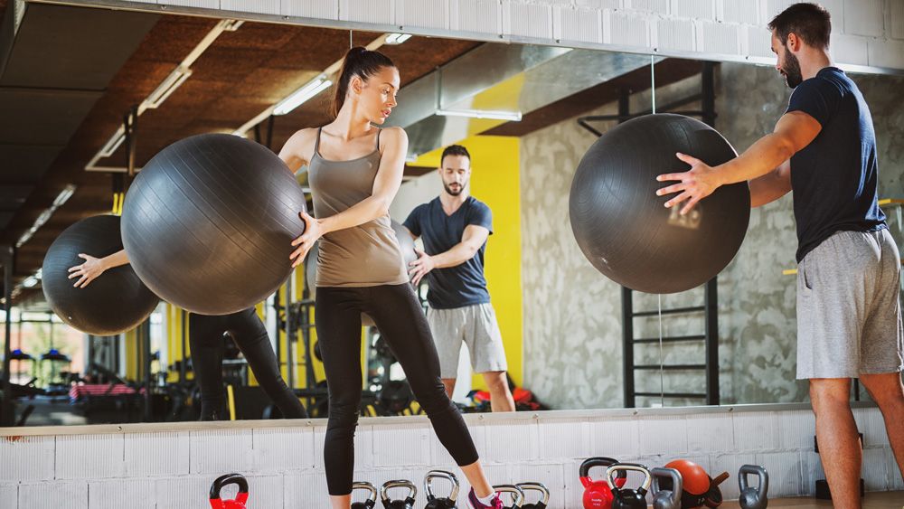 This Exercise Ball Workout Hits Muscles All Over The Body | Coach