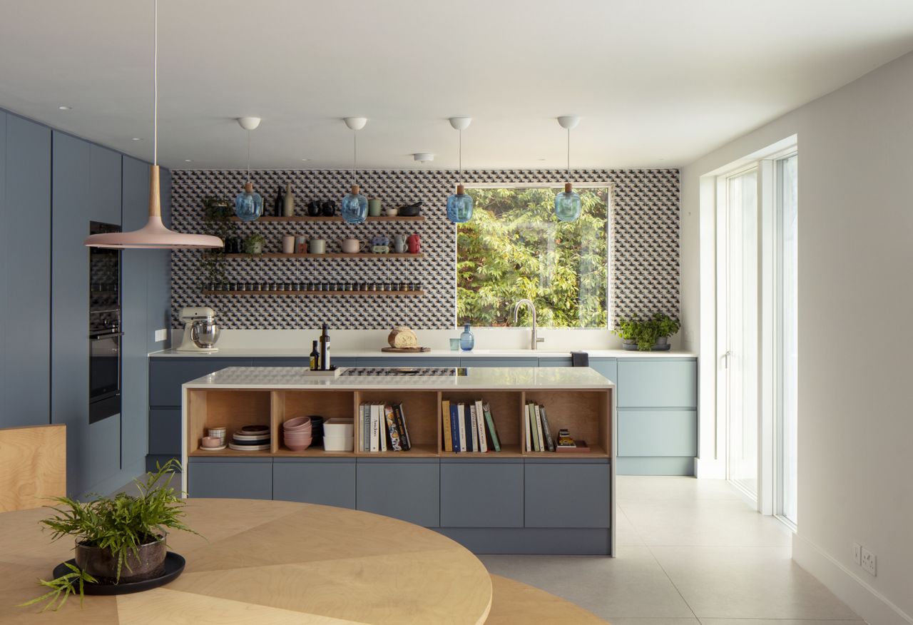 Kitchen in new extension with geometric tiles
