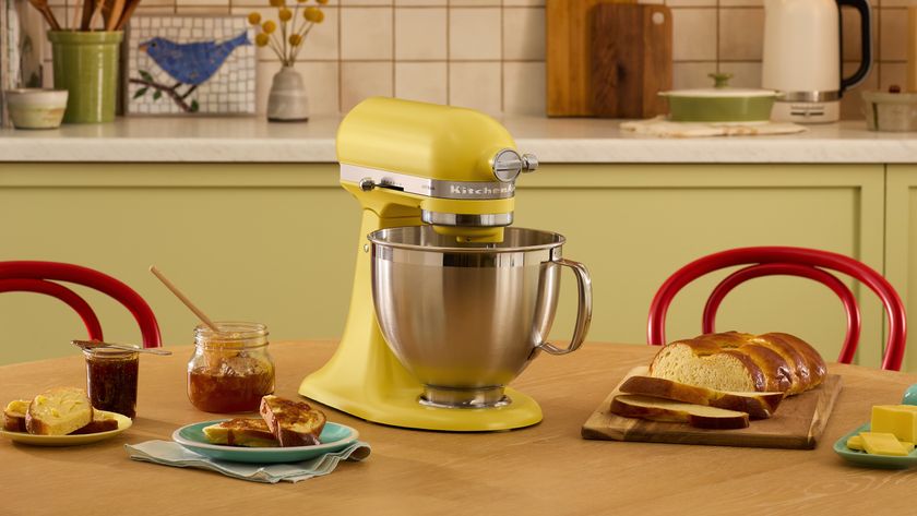 KitchenAid stand mixer in Butter on kitchen table with breakfast items