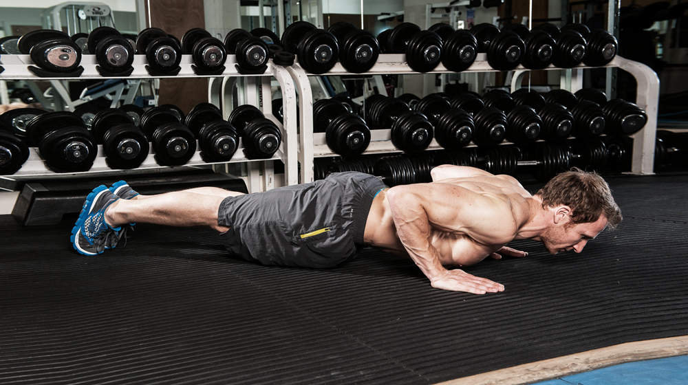 Man performs press-up