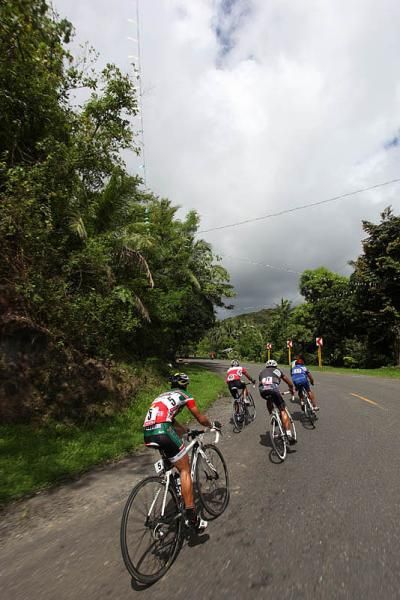 A break forges clear at the Tour of Camsur.