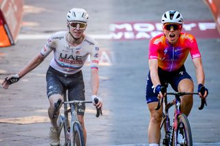 SIENA, ITALY - MARCH 04: (L-R) Lotte Kopecky of Belgium on second place and the race winner Demi Vollering of The Netherlands and Team SD Worx cross the finish line during the Eroica - 9th Strade Bianche 2023, Women's a 136km one day race from Siena to Siena 318m / #StradeBianche / on March 04, 2023 in Siena, Italy. (Photo by Luc Claessen/Getty Images)