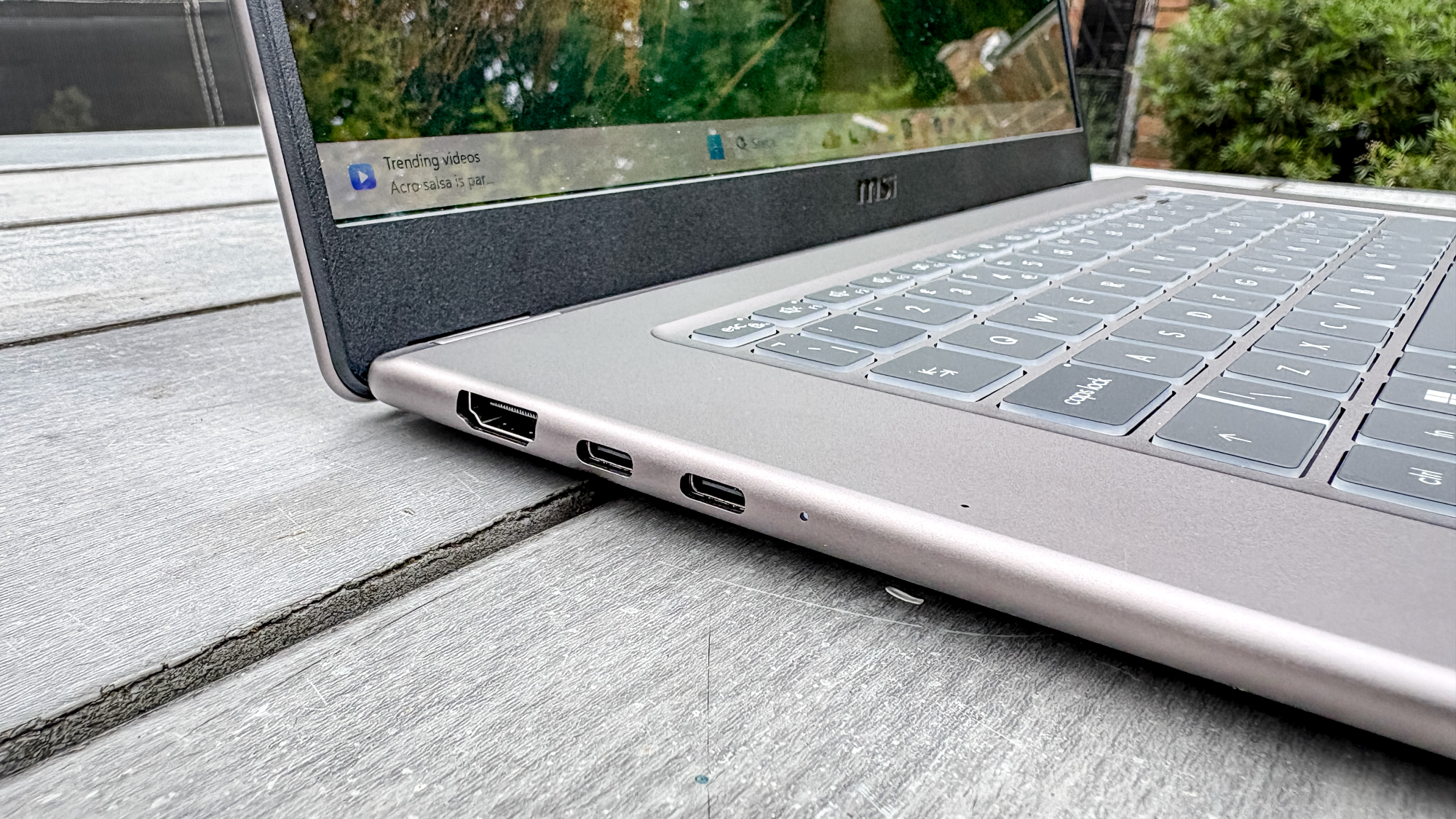 MSI Prestige 16 AI+ on table showing USB-C ports