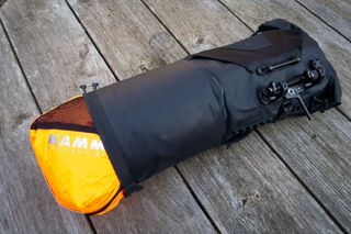 Inserting a sleeping bag into the Tailfin bar bag