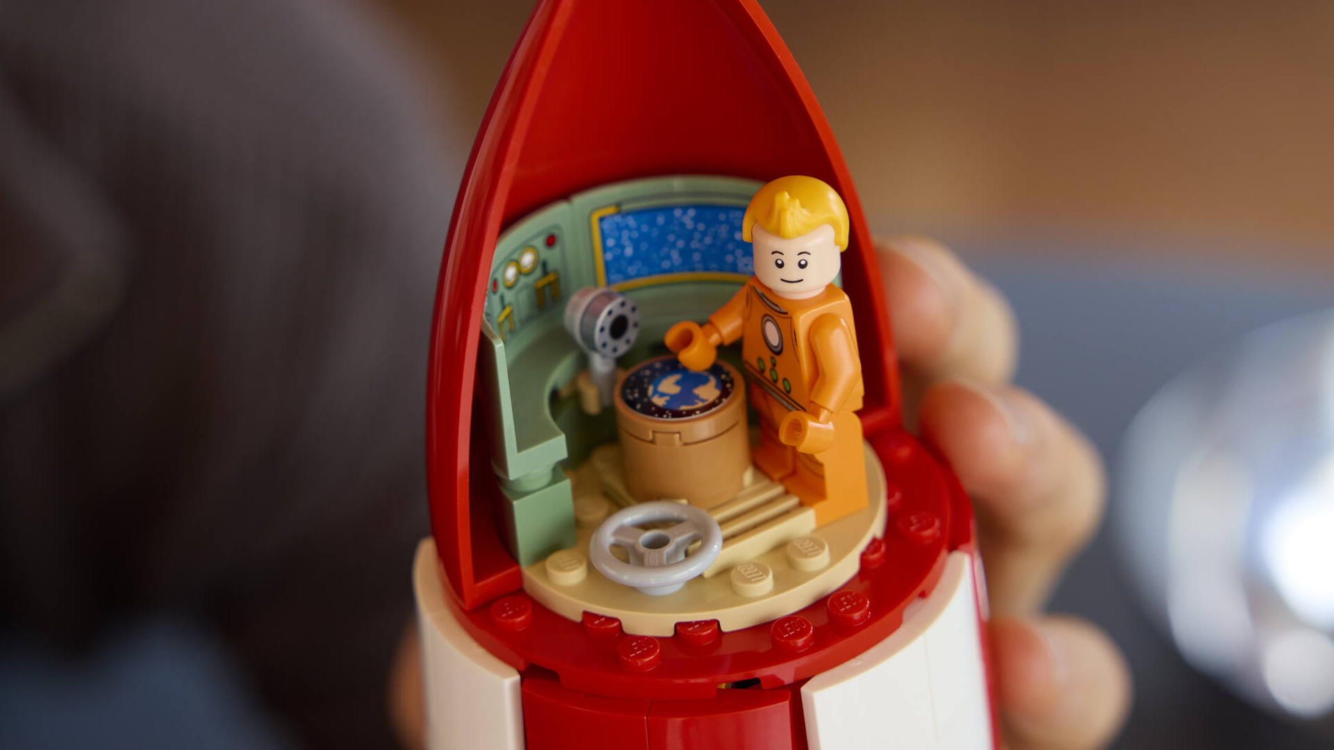 Tintin minifigure in the Moon Rocket cockpit
