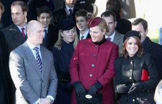 Zara Phillips and Mike Tindall leave the Christmas Day service at Sandringham on December 25, 2013 in King's Lynn, England