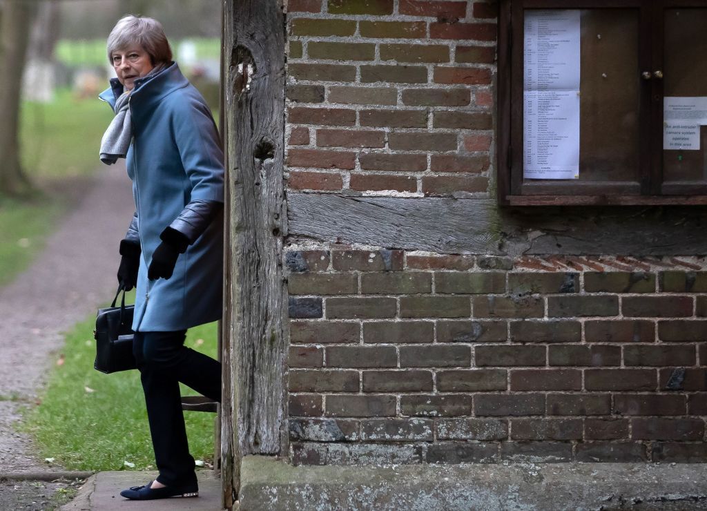 Britain&amp;#039;s Theresa May leaves church before Brexit vote