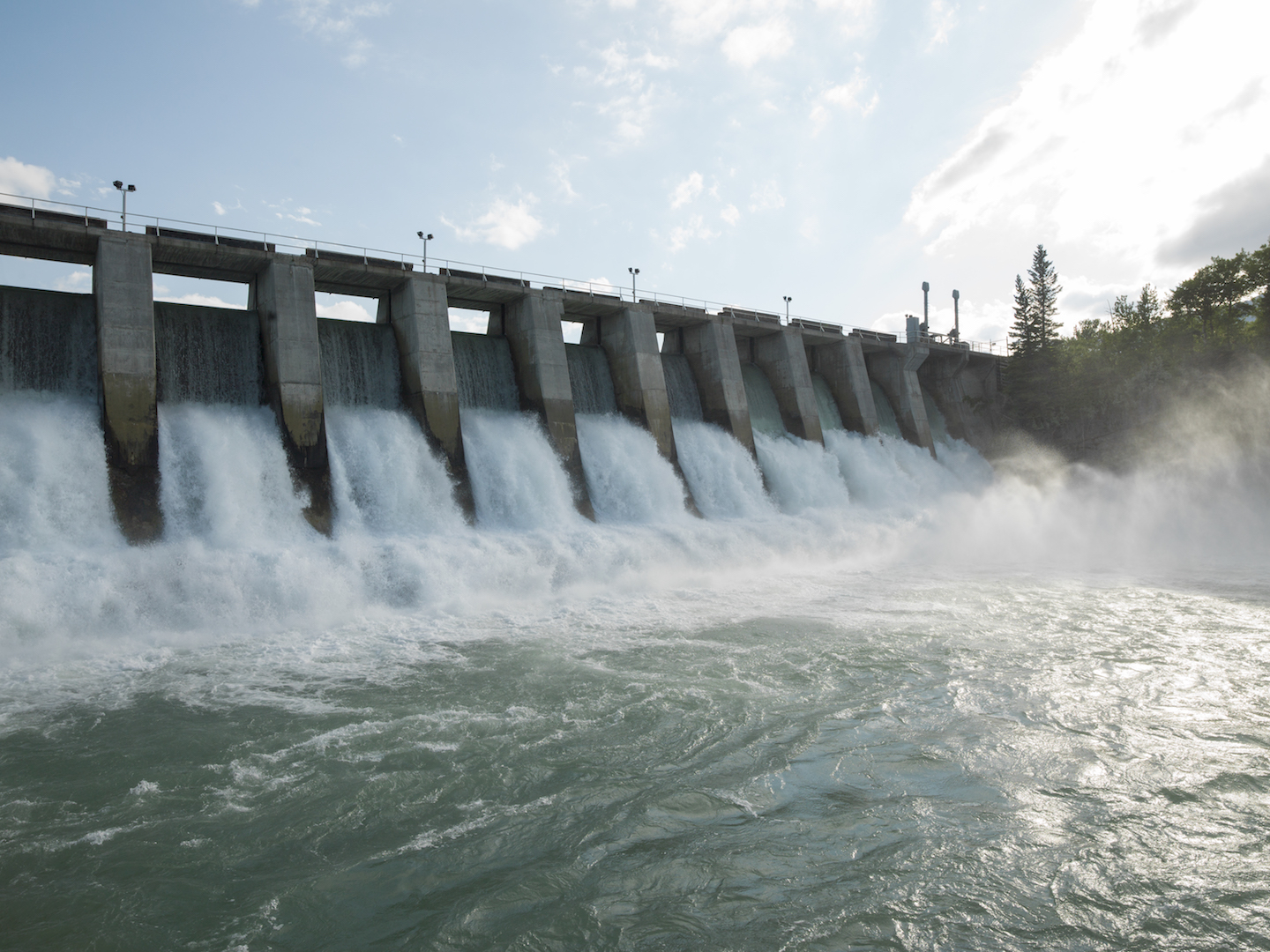 A hydropower dam releasing water.