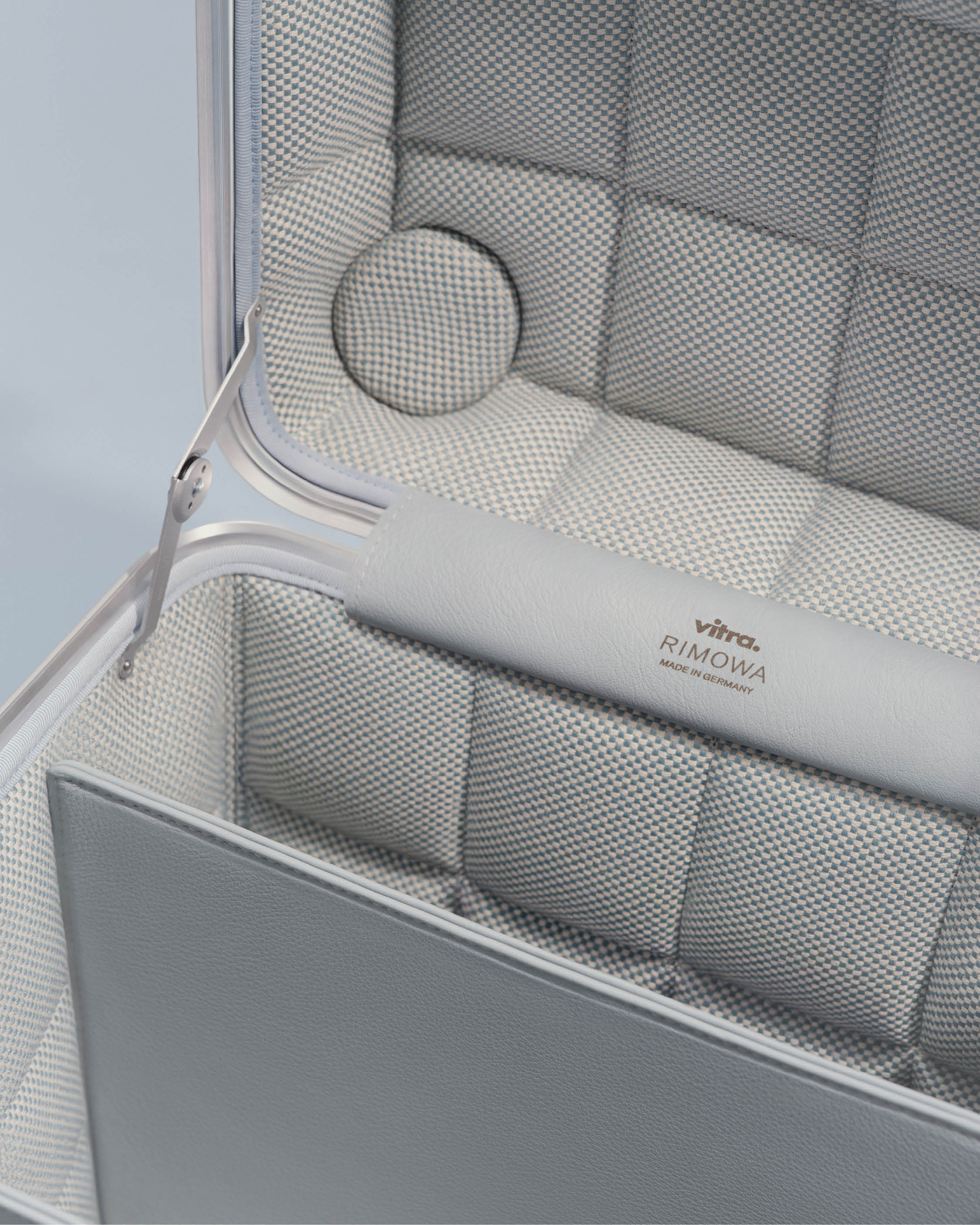 aluminium storage stool with padded upholstered interior
